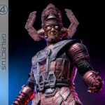 The Fantastic Four: First Steps Jumbo Sofvi Masterpiece Vinyl Figure Galactus 70 cm Action figures Marvel Marvel Studios is set to introduce its First Family in The Fantastic Four: First Steps, a stylish, 1960s-inspired reboot that blends retro-futurism with thrilling superhero adventure. In The Fantastic Four: First Steps, Galactus emerges as a cosmic threat of an unimaginable scale, testing the Fantastic Four's power and unity. His gigantic presence dominates the screen, and now it dominates your display shelf. Sideshow and Hot Toys introduces a new product line: Sofvi Masterpiece Series, which focuses on high-quality vinyl figures with unique artisanal charm. We are proud to present the Galactus Jumbo Sofvi Figure. Crafted from vinyl material, the figure stands an imposing 70cm tall with 6 points of articulation. His head, upper arms, forearms, and waist are rotatable for commanding display options. His head sculpt features LED-lit eyes that glow with cosmic energy, while finely painted metallic red and purple finishes bring his armor to vivid life. The Galactus Jumbo Figure is more than a collectible, it's a Sofvi art piece that bridges toy nostalgia and high-end display craftsmanship. Contrasting the scale of the massive figure are five miniature figures, including Mister Fantastic, Invisible Woman, Human Torch, The Thing, and Silver Surfer, designed to be attachable to Galactus' body. Embrace the cosmic might, because no Fantastic Four display is complete without Galactus towering over them all.